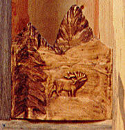 Horn Mountain Living - Hand Carved Gun Cabinet Detail